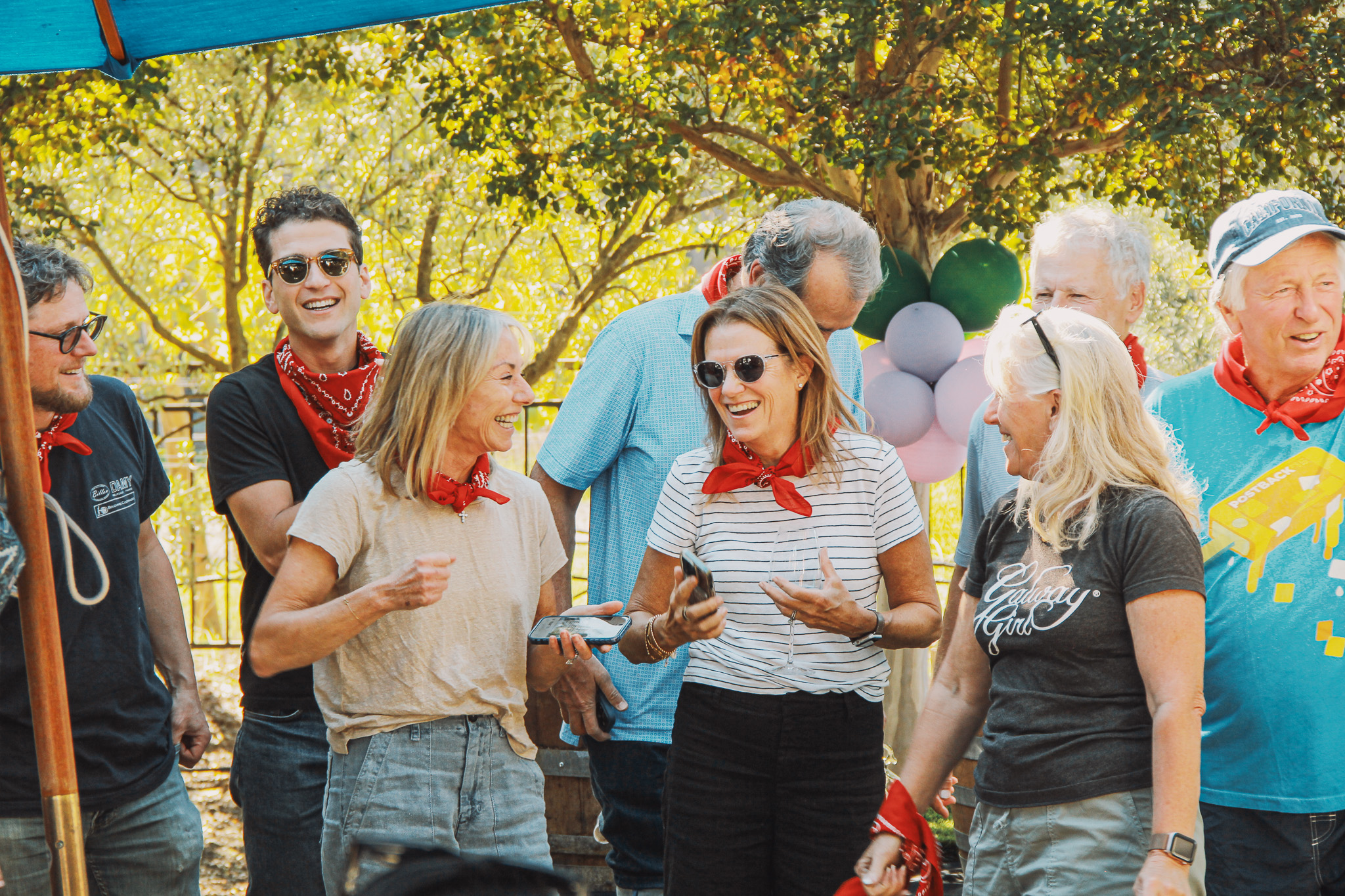 Guests laughing together during the annual Grape Stomp at Hamilton Family Wines.