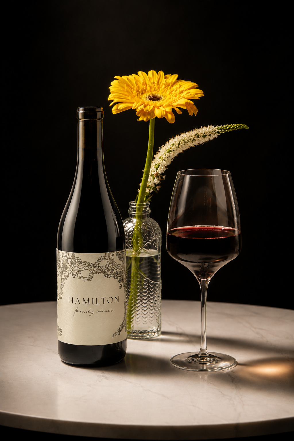 Hamilton Family Wines 2023 Windsor Oak Vineyard GSM with a glass of red wine.