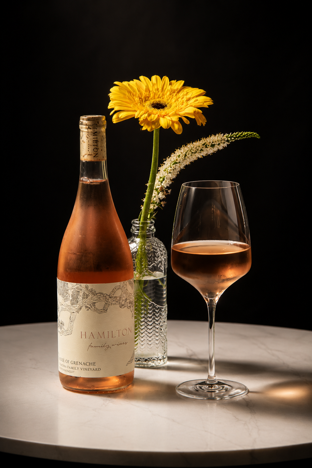 Hamilton Family Wines 2025 Rosé of Grenache with a glass of rosé.