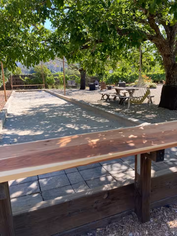Bocce court beneath the trees on the Hamilton family estate.
