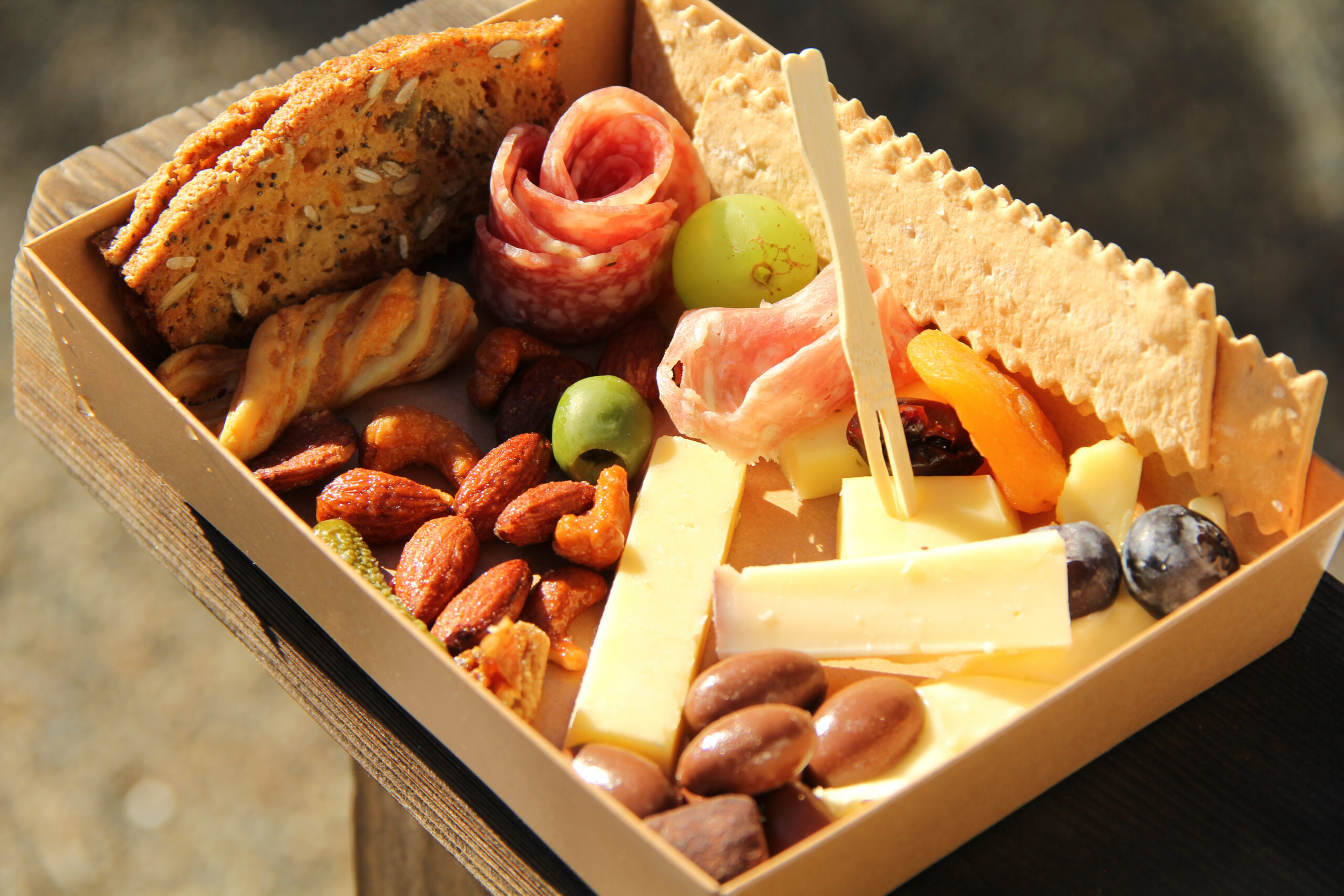 Seasonal cheese and charcuterie box similar to the board served after the Kenwood Escape