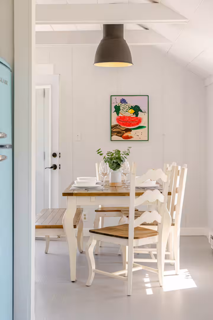 Light-filled dining area inside the Carriage House.
