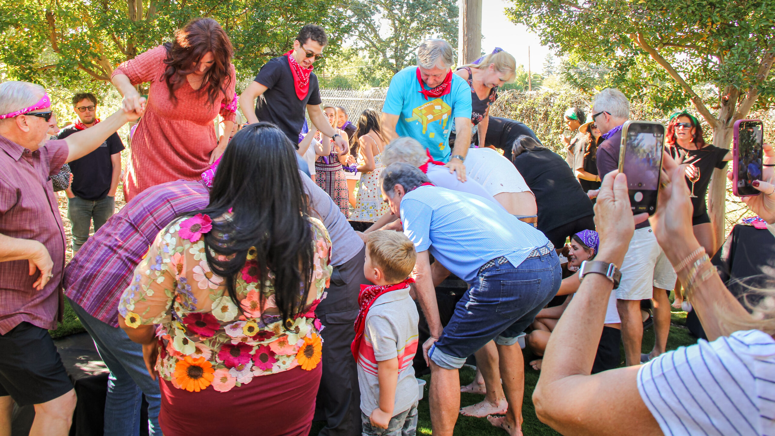 Guests competing in the Hamilton Family Wines grape stomp